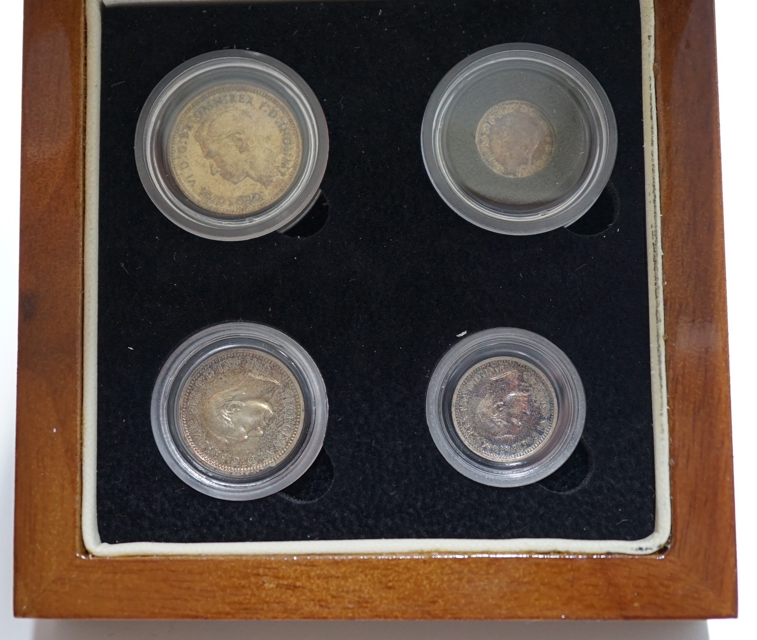 British silver coins, George VI four coin set of Maundy coins, 1939, toned UNC, in London mint case